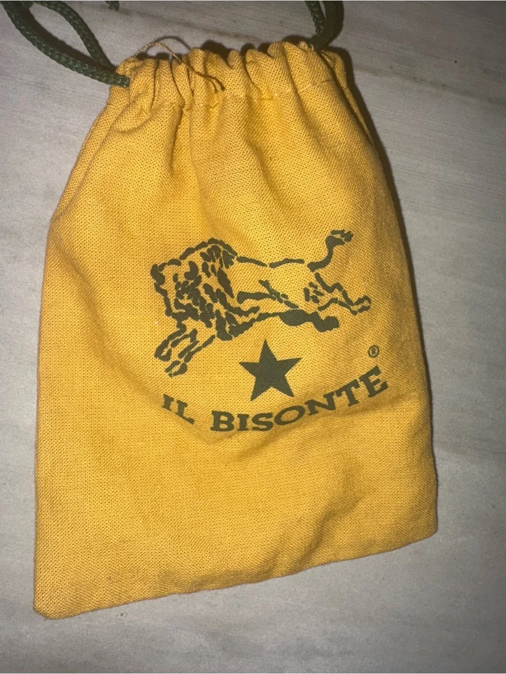Authentic il bisonte Red Leather Key Holder with Yellow Drawstring Pouch